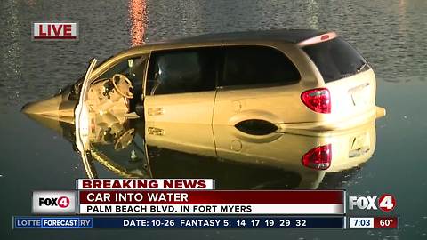 Van driven into retention pond