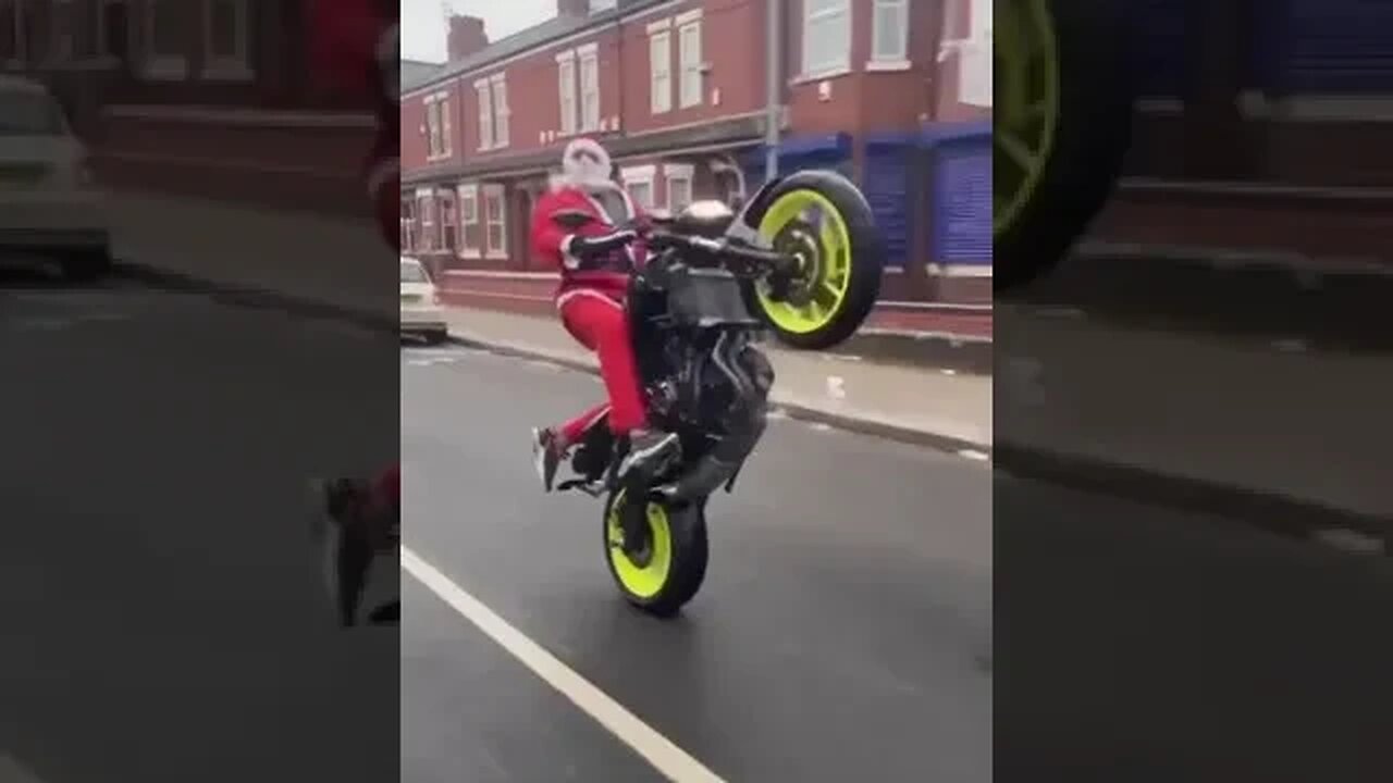 SANTA DOING WHEELIE