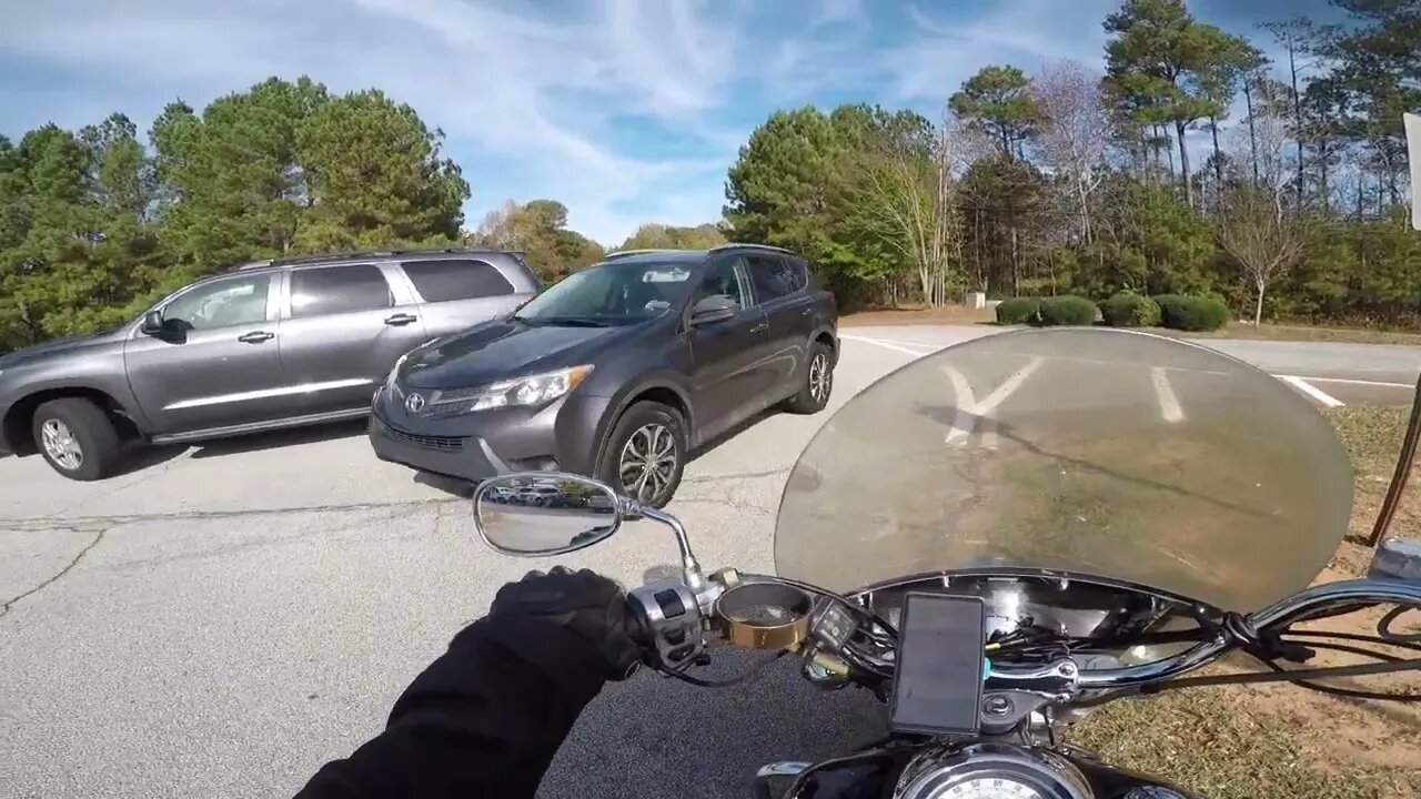 Biker's Surprise Leaving the School Drop-off Lane!