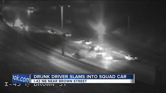 Accused drunk driver smashes into marked squad car