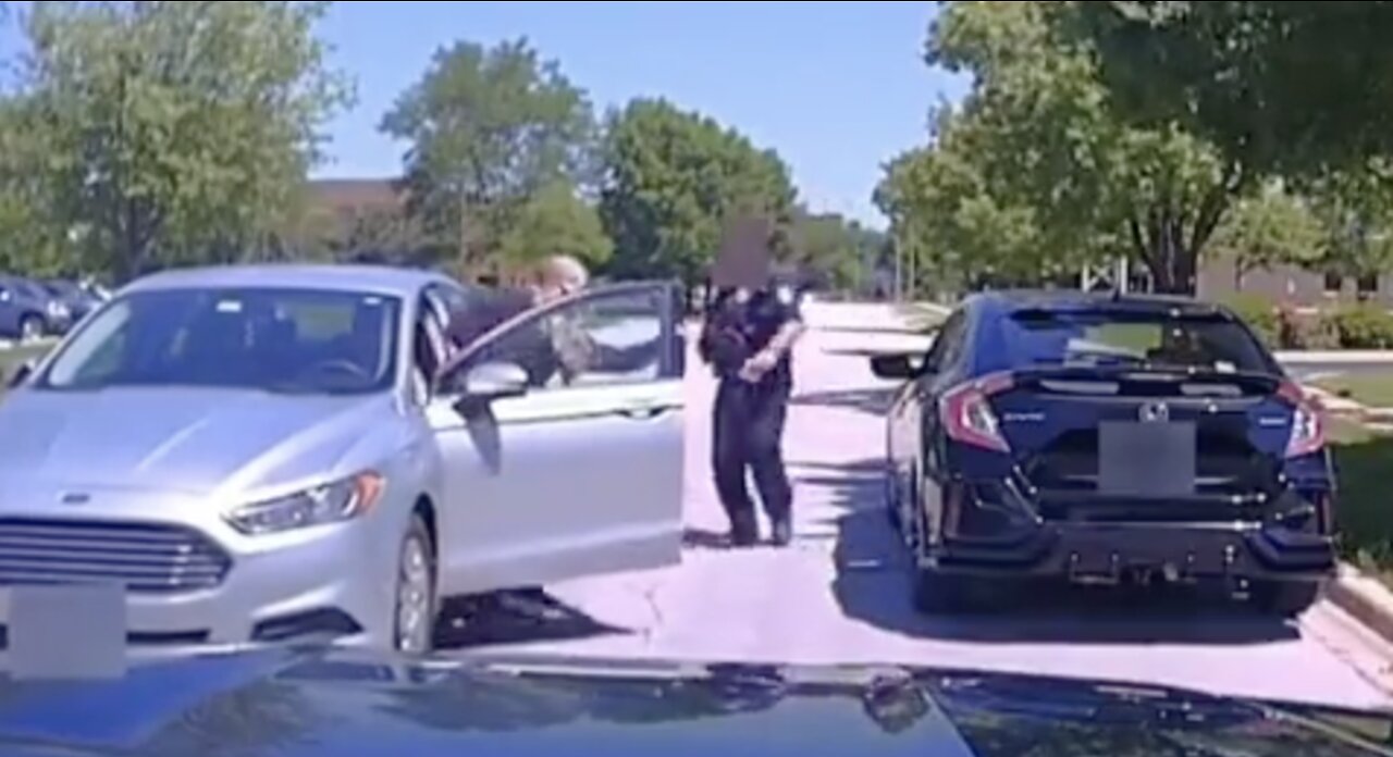 Car Randomly Pulls Up Next to Cop and Attacks Him With an Axe