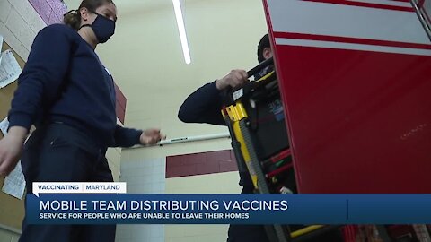 Mobile team distributing vaccines