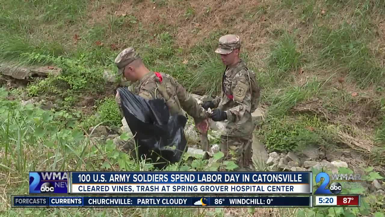 100 U.S. Army soldiers spend Labor Day clearing vines, trash in Catonsville