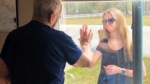 Woman Shows Engagement Ring To Grandfather