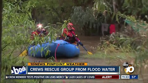 Crews rescue group from flood water