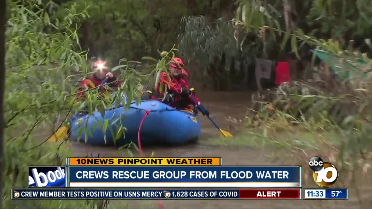 Crews rescue group from flood water