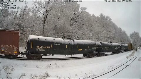 Highhood Forward Leader on NB CP 261 Manifest w/ CP 7018 Mid DPU at Ottumwa, IA on January 22, 2023