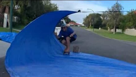 Surfers get barreled on the street