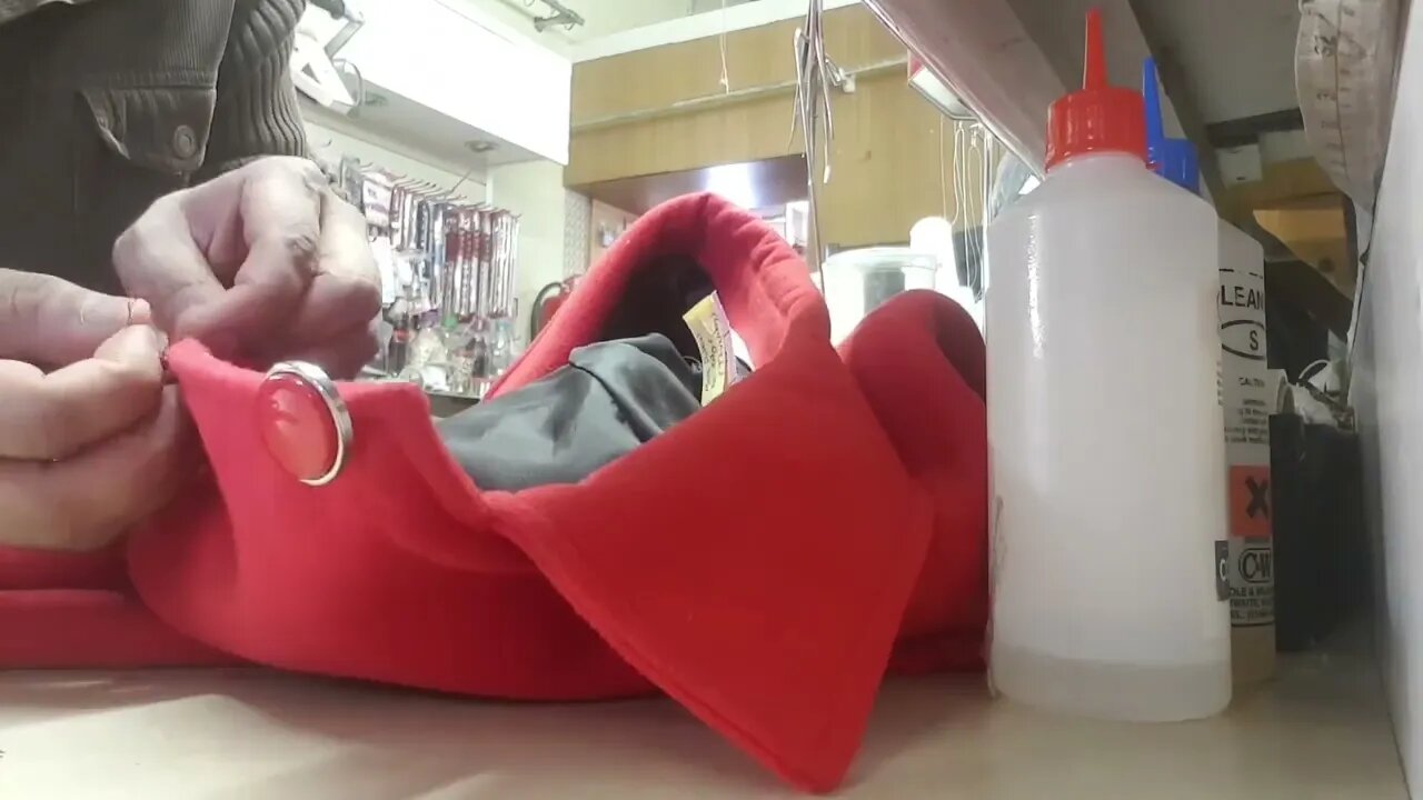 moving buttons on a coat