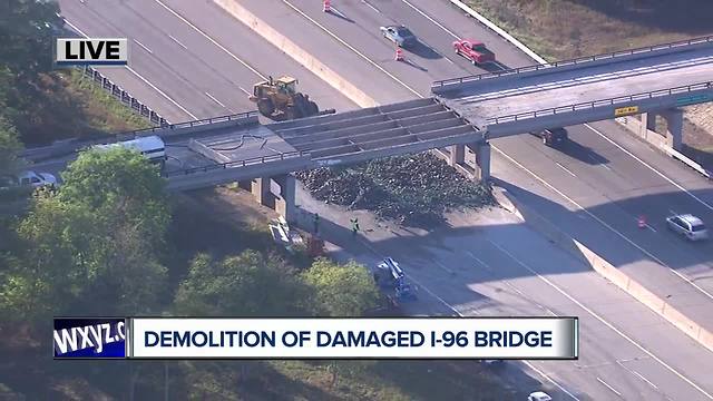 Demolition underway on I-96 overpass after semi crash