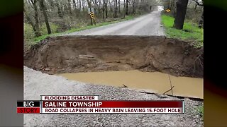 Massive sinkhole-like opening in Southeast Michigan leaves road impassable