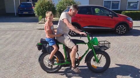 Sharing is caring: brother and nephew enjoy a ride on the UniMoke by Urband Drivestyle e-bike