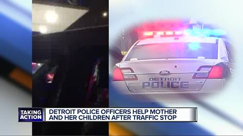 Detroit police officers help mother and her children after traffic stop