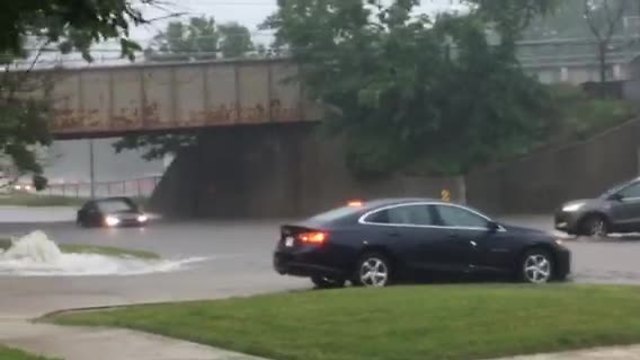 'Sewers can't take it': Local roads flood as rain pours down