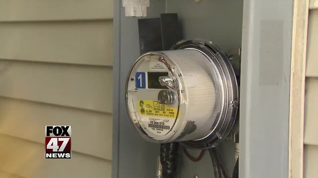 Woman charged with taking off smart meter