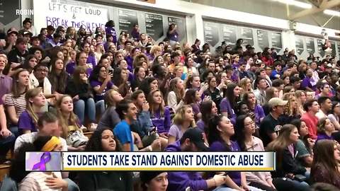 Robinson High School students turn a basketball game into statement against domestic abuse