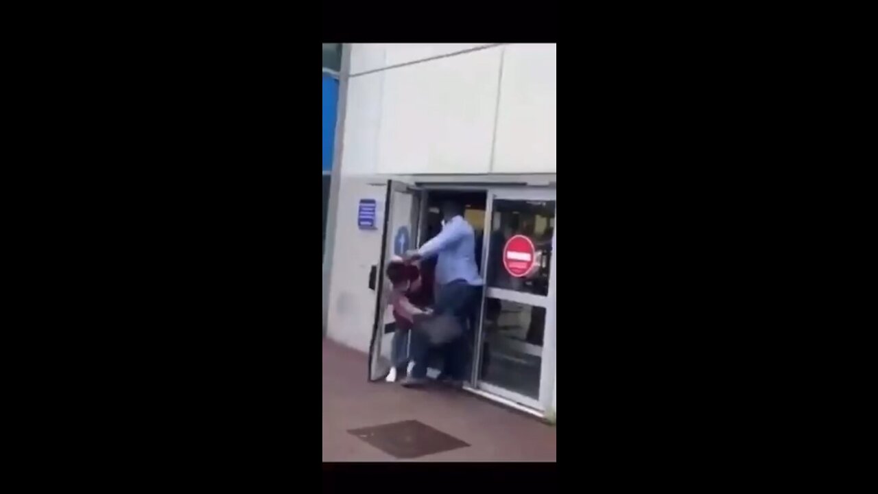 France - Antifa gorillas preventing people from entering Elite satanic Food Market!