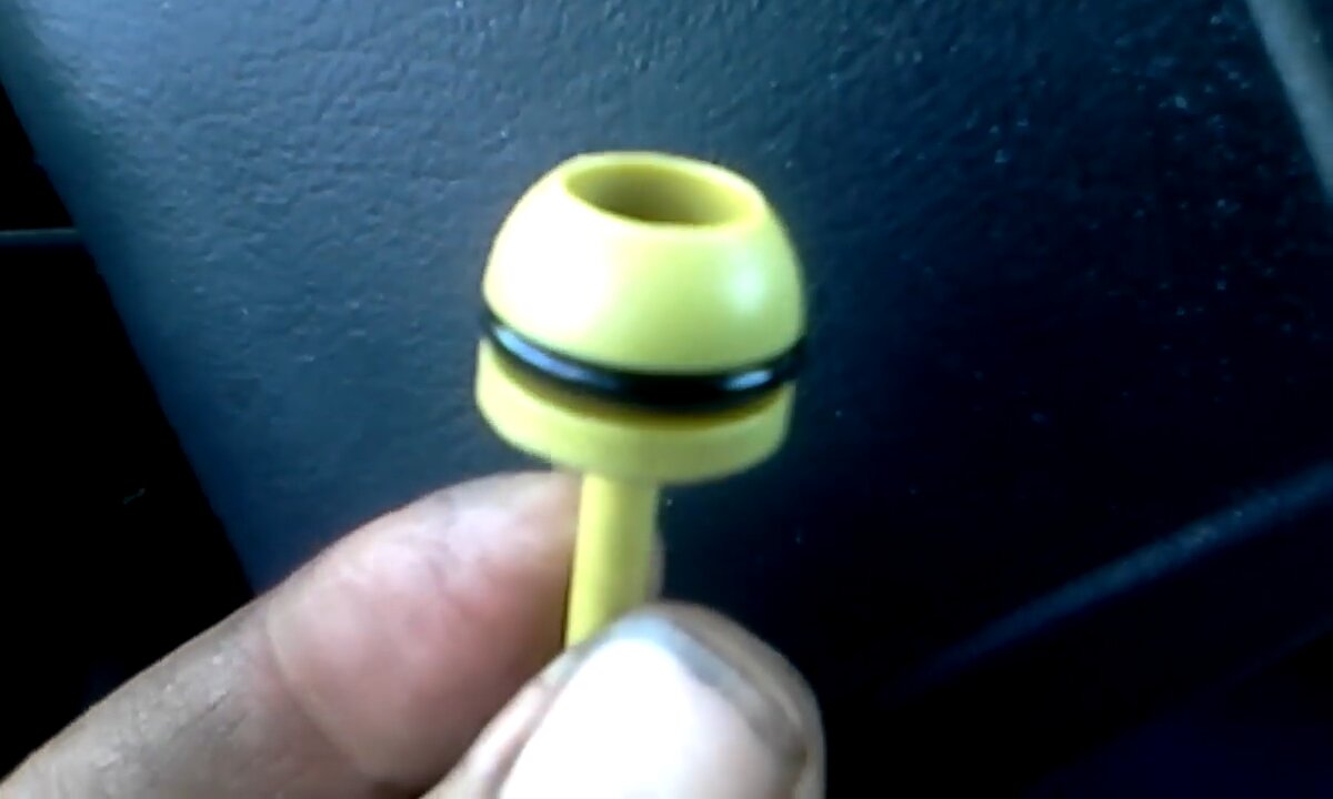 Discarding the Ford Factory Installed Dust Plug after 17 years!