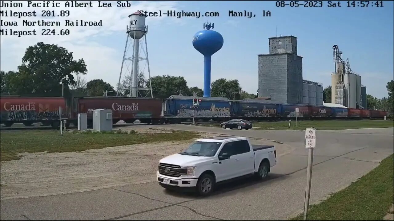 NB Canadian Hopper Grain with UP, CP and CN power in Manly, IA on August 5, 2023