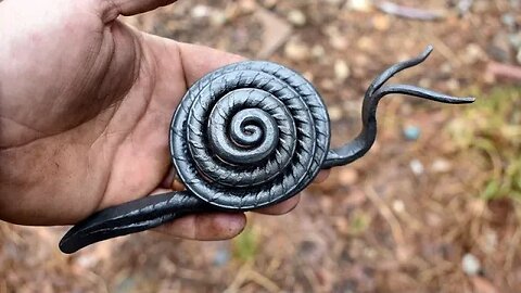 Forging a Snail from scrap rebar