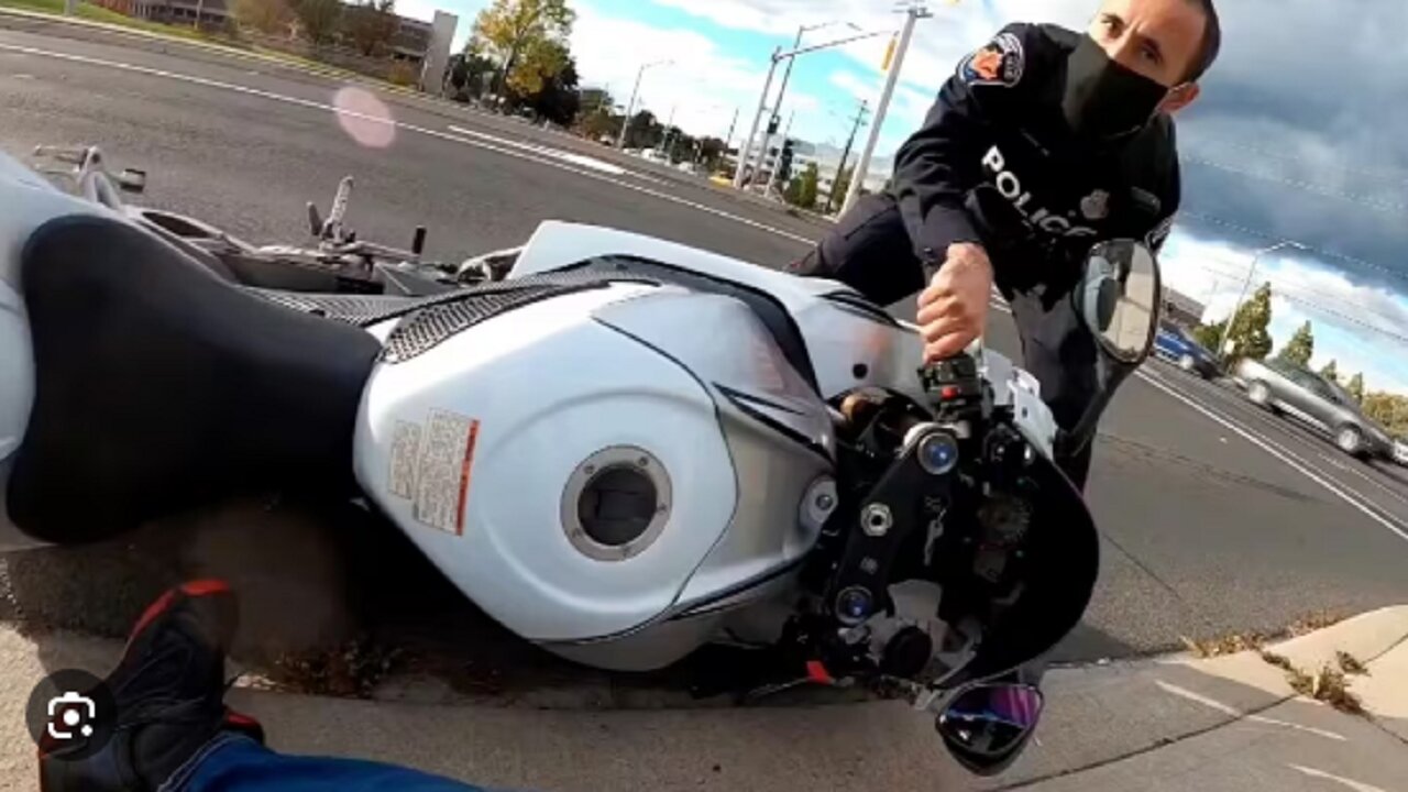 Motorcyclist drives state trooper into oncoming traffic #Shorts