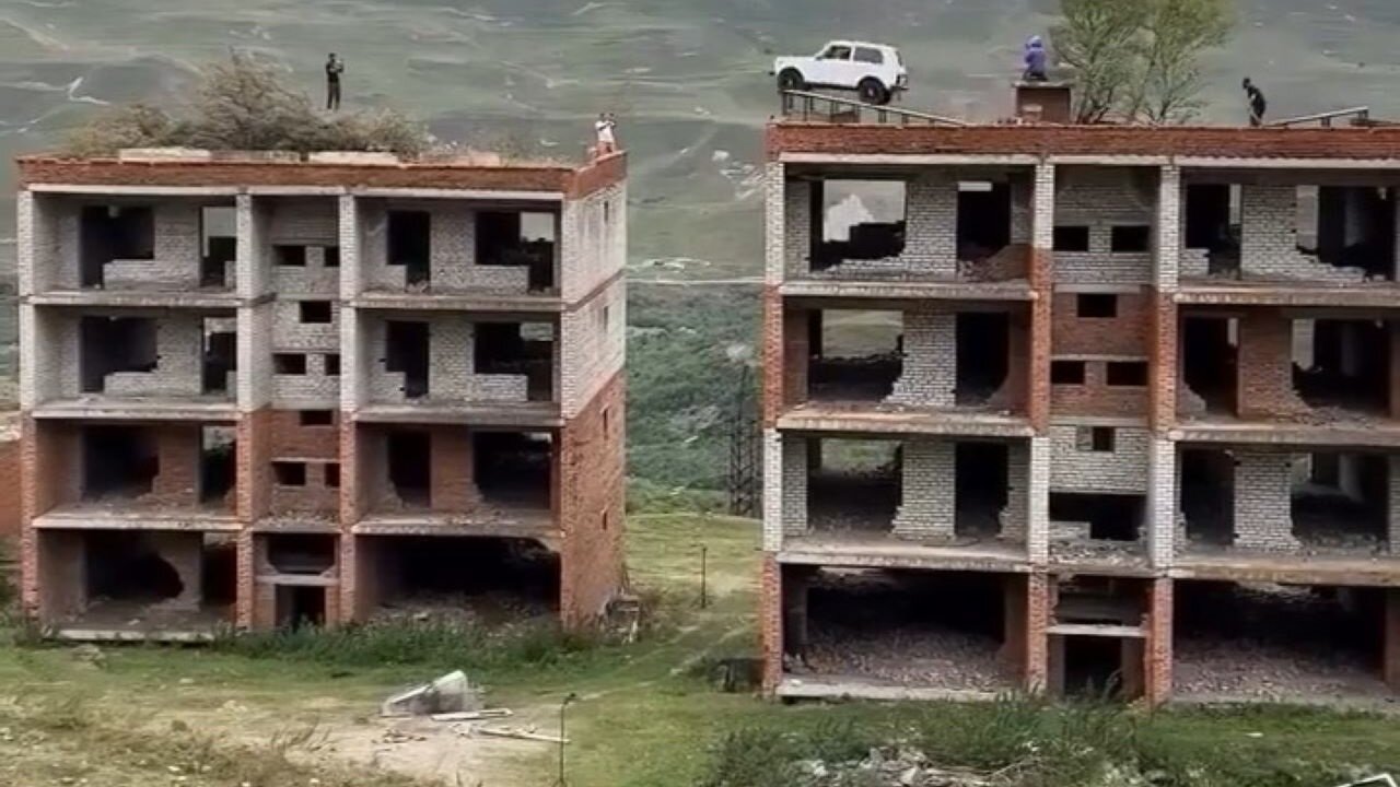 Seen Too Many American Action Movies: Try Jumping A Car From One Building To The Next, Ends Horribly