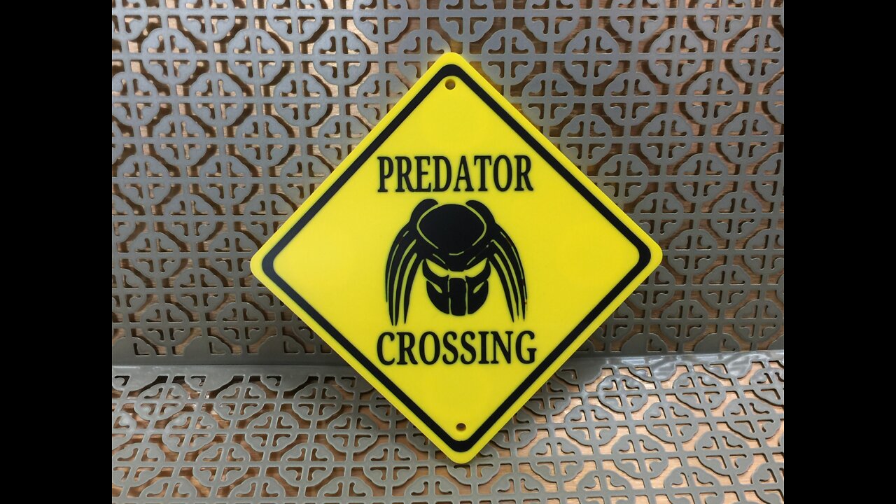 Predator Crossing Sign