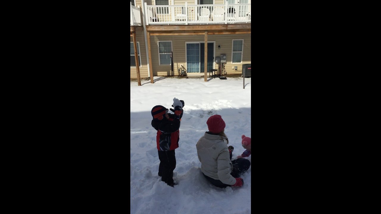 Mommy gets crowned with huge snowball