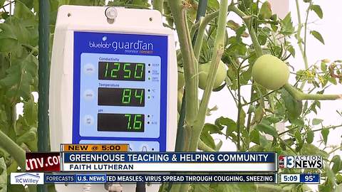 School greenhouse teaching, helping community