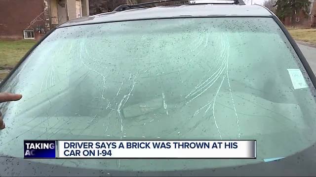 Driver say a brick was thrown at his car on I-94