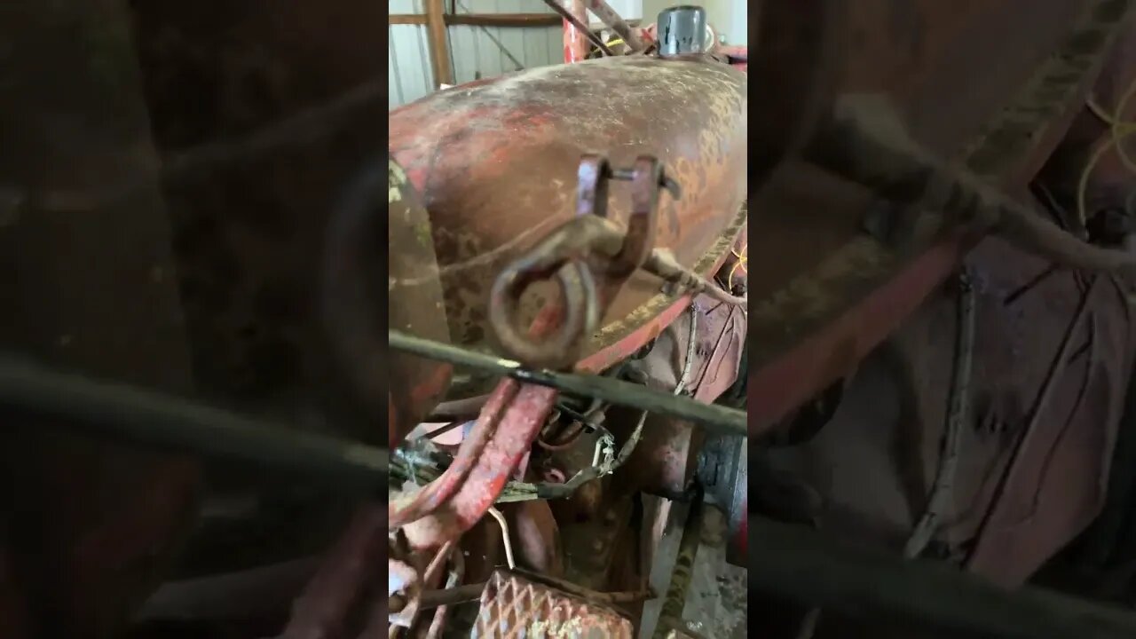 Farmer Fixes Farmall H fights back: Hydraulic oil shower.