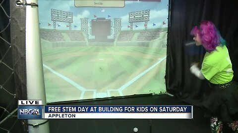 Checking out the 'Big League Fun' exhibit at the Building for Kids