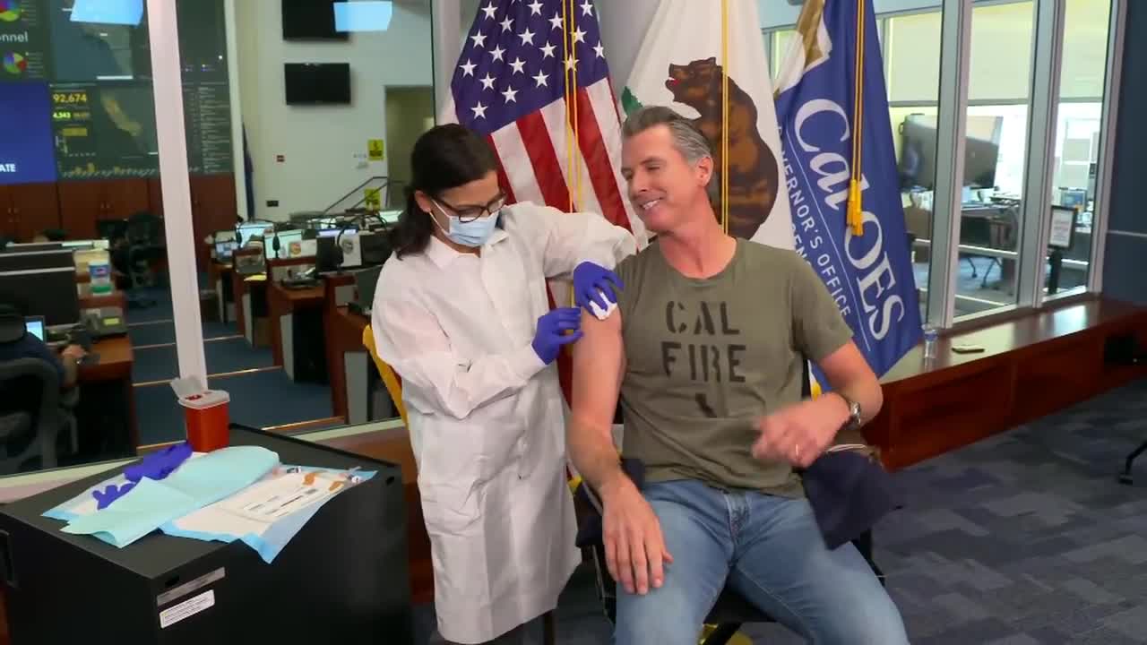 Governor Gavin Newsom gets flu shot during press briefing