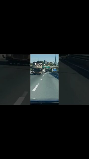 Luggage hanging out onto highway #funny