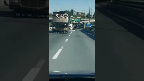 Luggage hanging out onto highway #funny