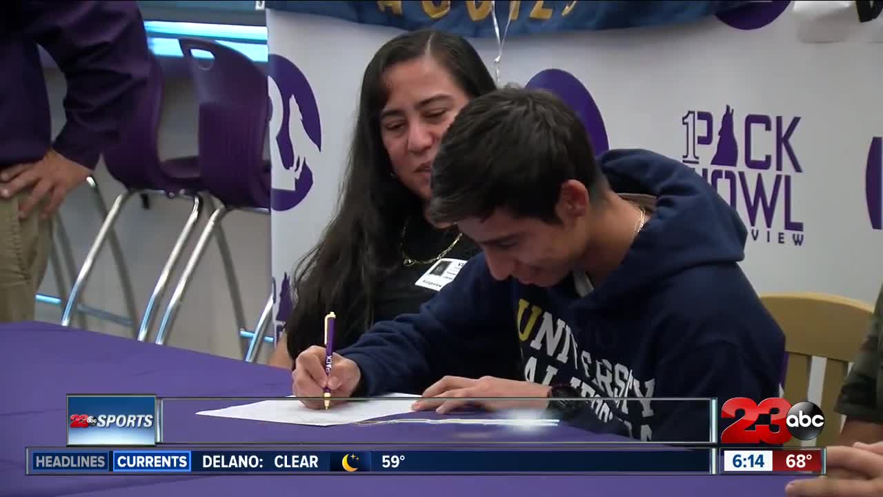 Alex Cuevas signs to continue running at U.C. Davis