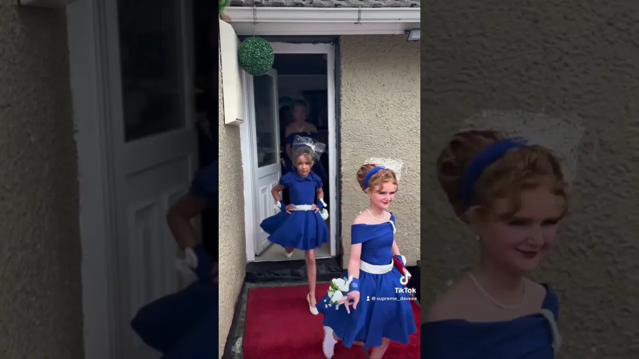 The girls in blue brides maid flower girl bridal party