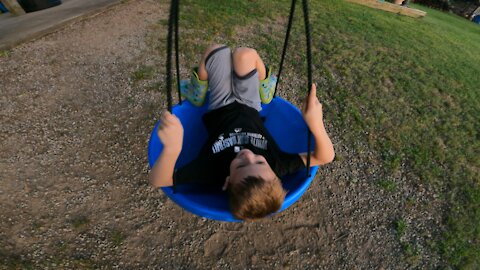 7yr old spins on swing