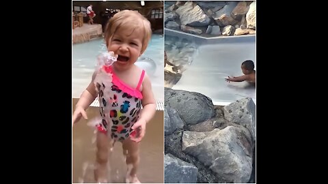 Babies playing in water