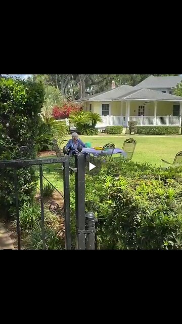 A kind man visits a 94-year-old grandmother on her birthday. Alone in her retirement home garden