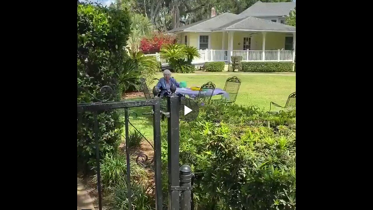 A kind man visits a 94-year-old grandmother on her birthday. Alone in her retirement home garden