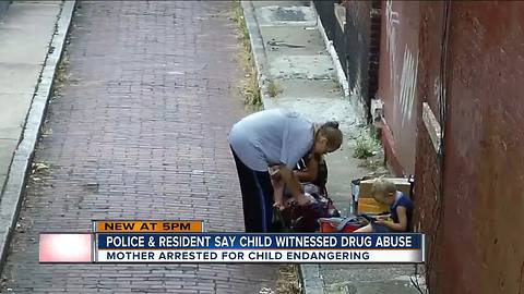 PD: Woman used drugs in alley with child present