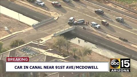 Car into canal near 91st Ave/McDowell