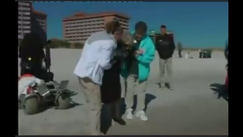 100 year old woman touches sea water for her first time