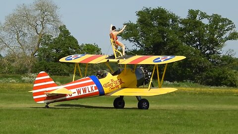 High Definition Slow Motion Of Wing Walker / Harvard & Spitfire Plus Wheels Up. Hand Held Filming.