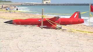 Air Force drone washes ashore on beach