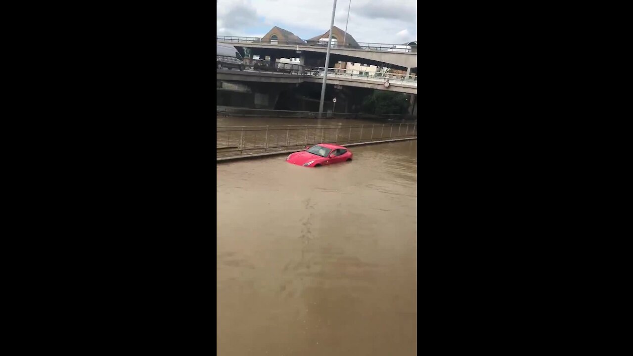 Eight people rescued after burst water main floods London road