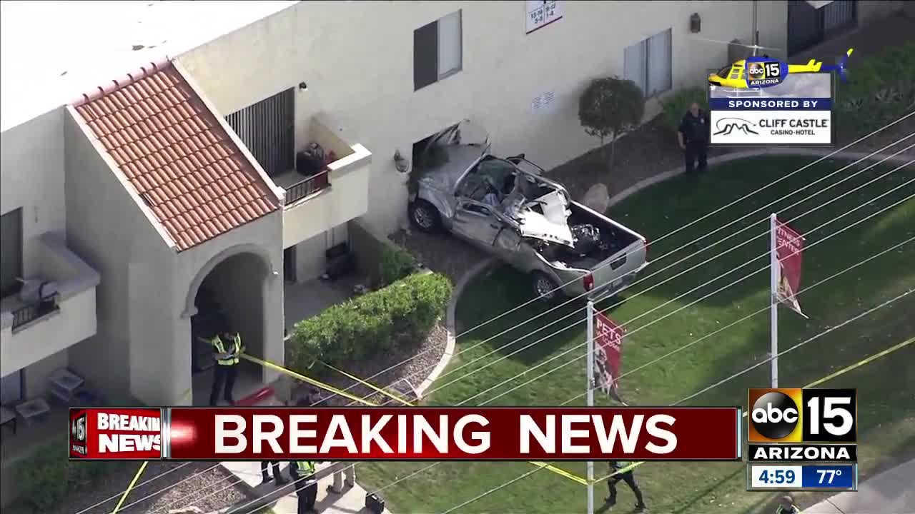 Truck crashes into building in Mesa