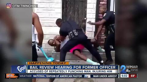 BPD officer seen beating man in viral video turns himself in to authorities