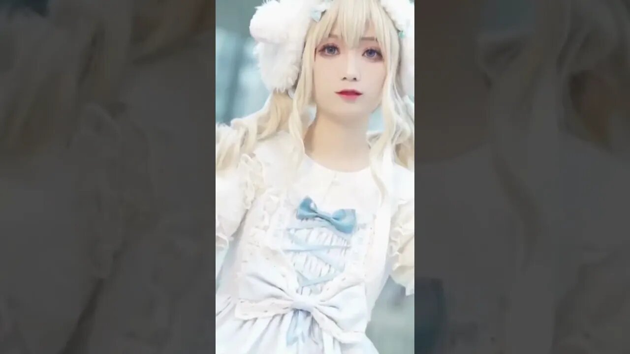 Chinese Girl With A Doll Face Dresses Up In Cosplay